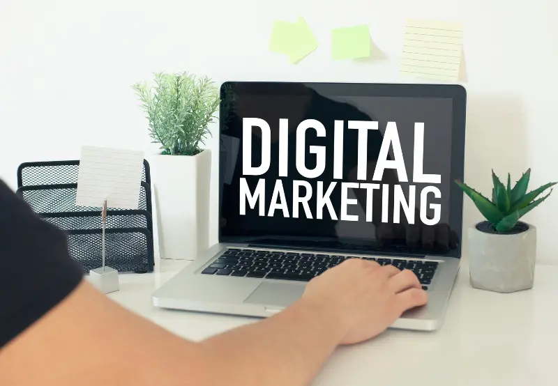 person at laptop learning about digital marketing