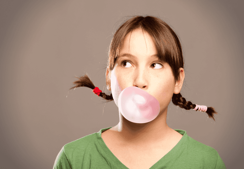 Girl cheing bubble gum